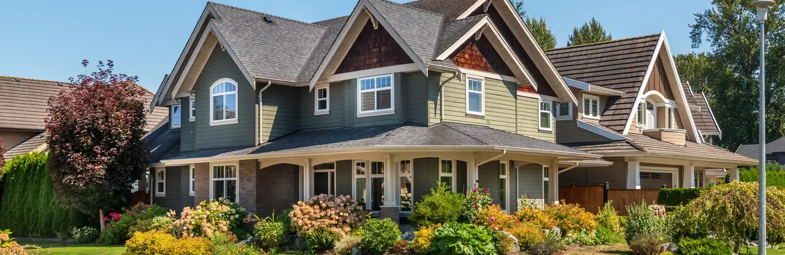 house with nice lawn and shrubs